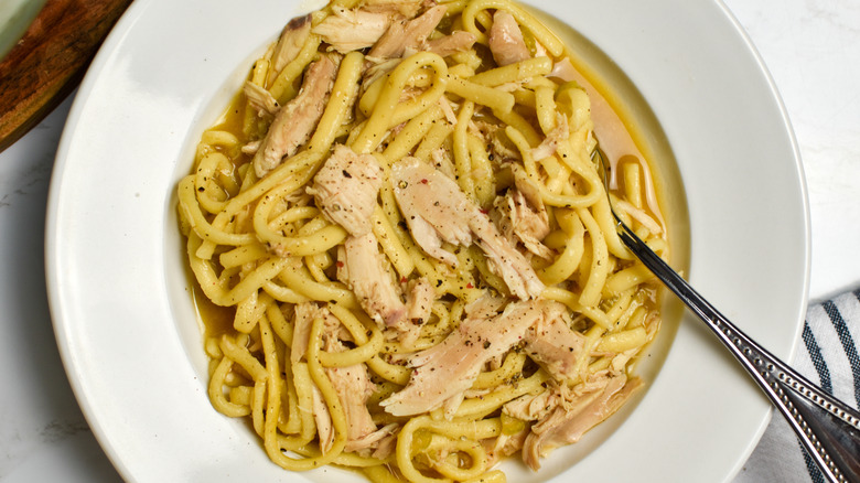 chicken and noodles in bowl