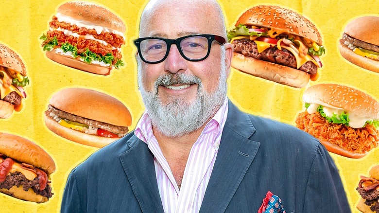 Andrew Zimmern and burgers on yellow background