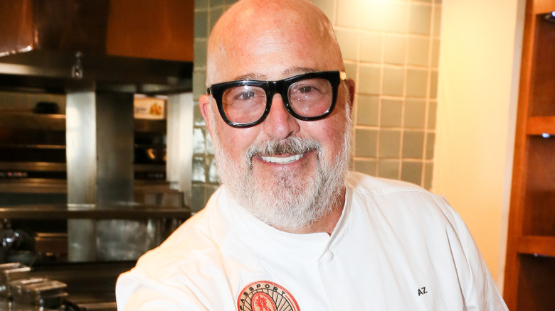 Andrew Zimmern smiling at event