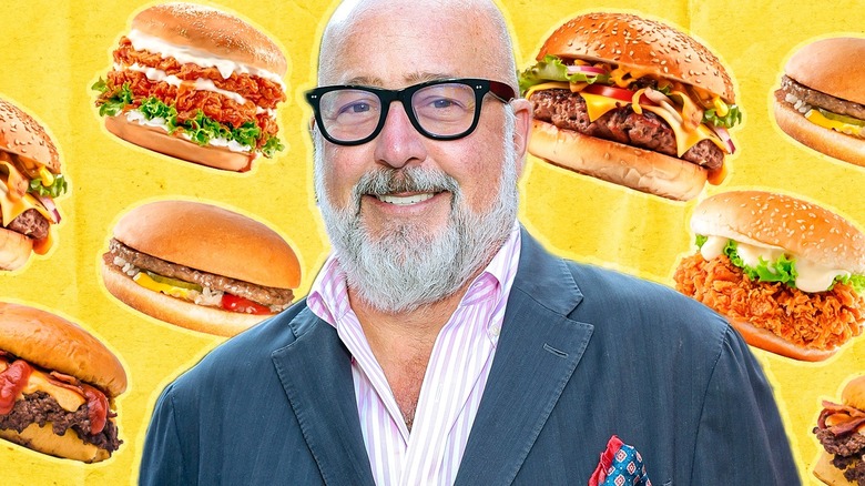 Andrew Zimmern and burgers on yellow background
