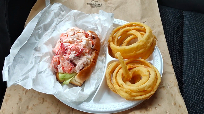 lobster roll from Belle Isle seafood served with onion rings