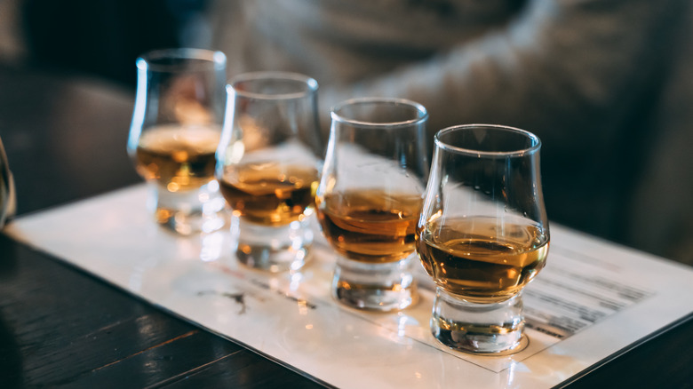 A flight of Scottish Whiskies served neat.