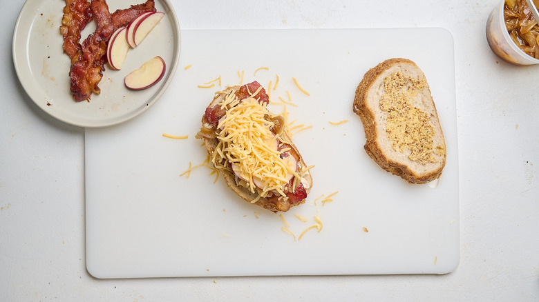ingredients layered onto bread slices