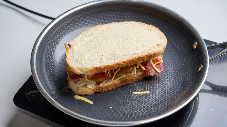 sandwich cooking in a skillet