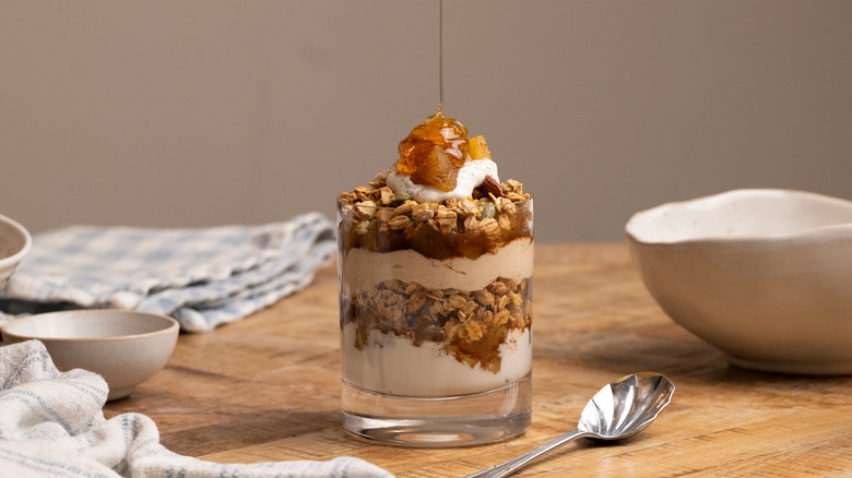 apple breakfast parfait with honey drizzle