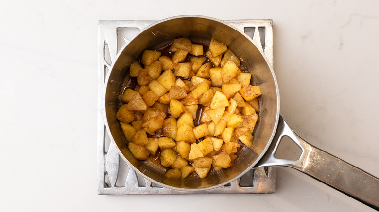 stewed apples cooling in pan