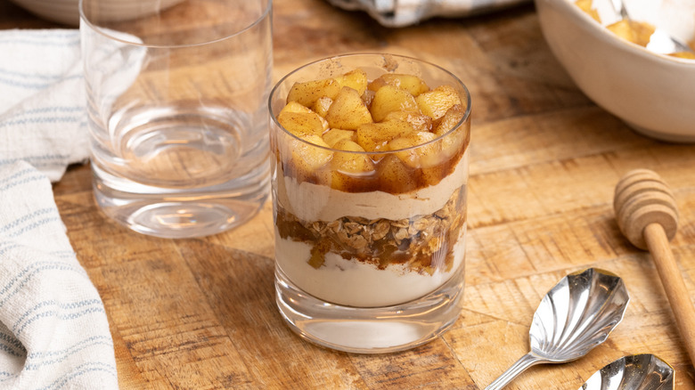 assembling apple breakfast parfaits
