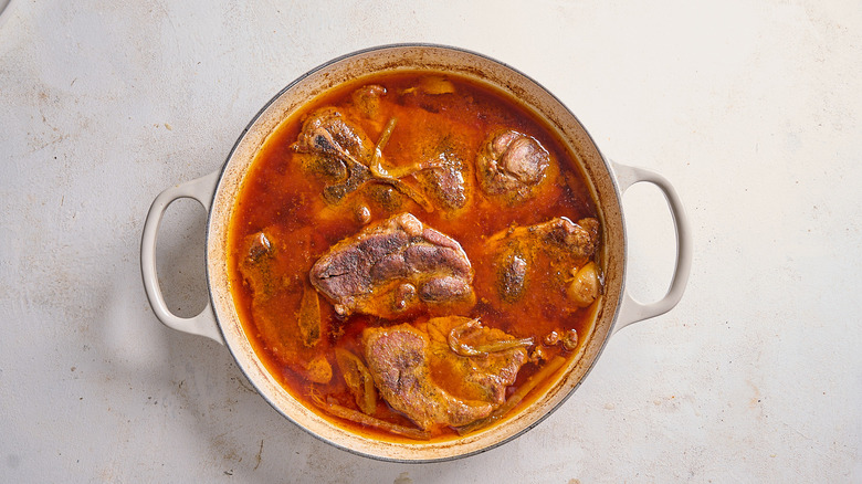 roast pork steak in a pan