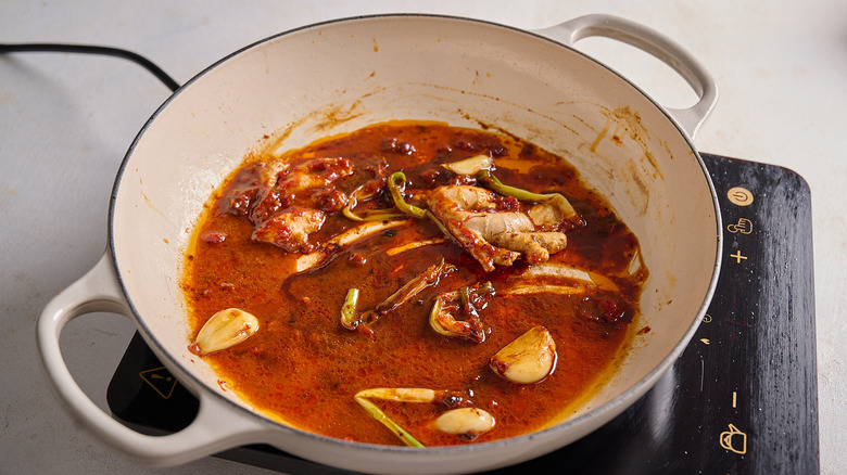 gelazing the pan with wine