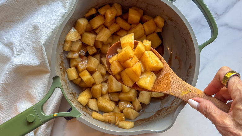 cooked apples in pot
