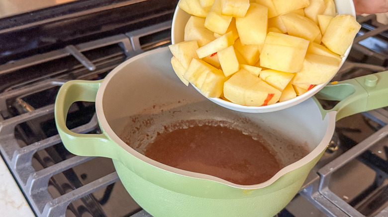 adding apple to pot