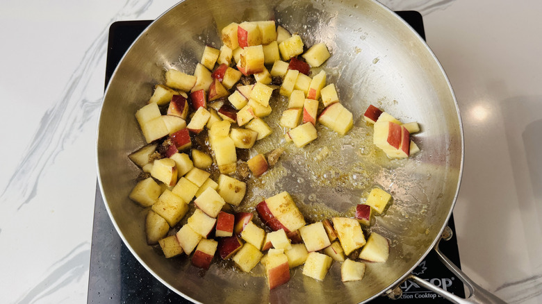 Diced apples in skillet