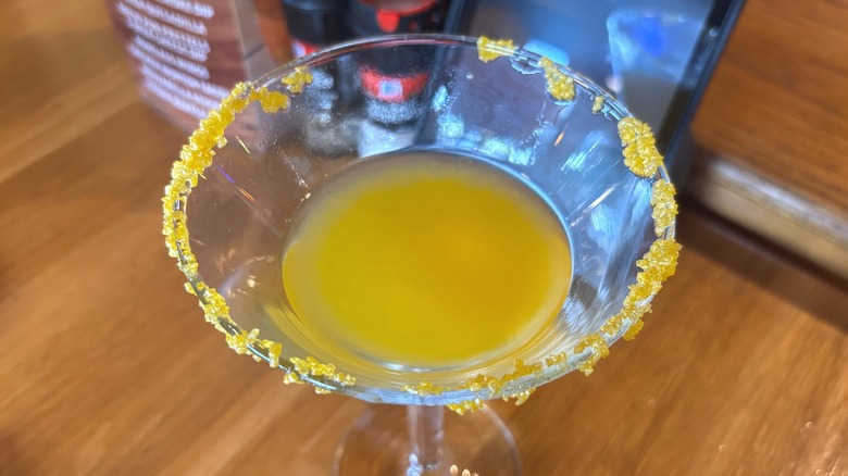 Applebees Golden Goose cocktail on wooden table