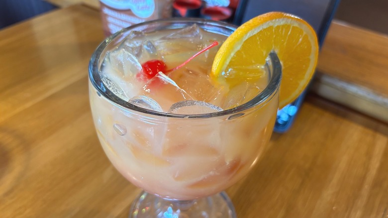 Applebees Mucho Captain Bahama Mama cocktail on wooden table