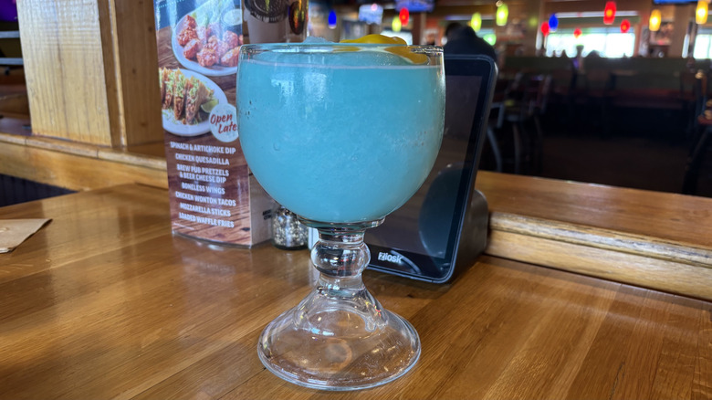 Three Applebees Cocktails on wooden table