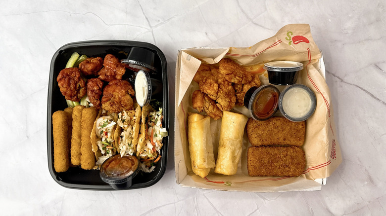 Applebee's Ultimate Trio and Chili's Triple Dipper on a marble counter