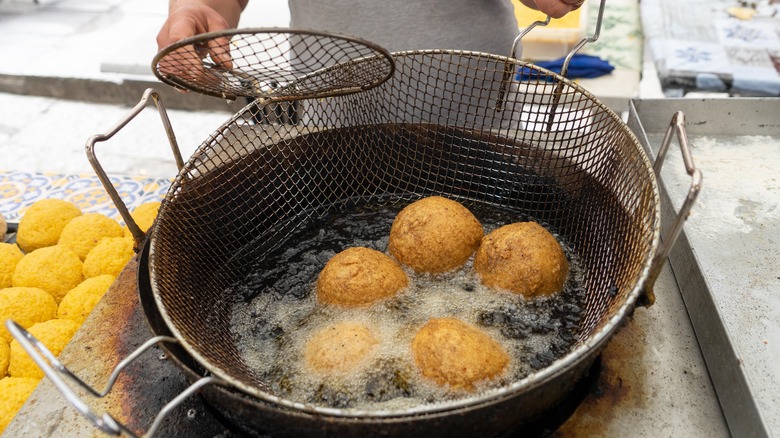 Frying rice balls
