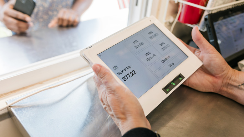 A close up of a Square register screen showing tip options