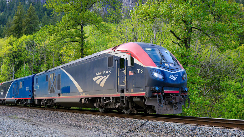 Amtrak Empire Builder train in Cascade mountains.