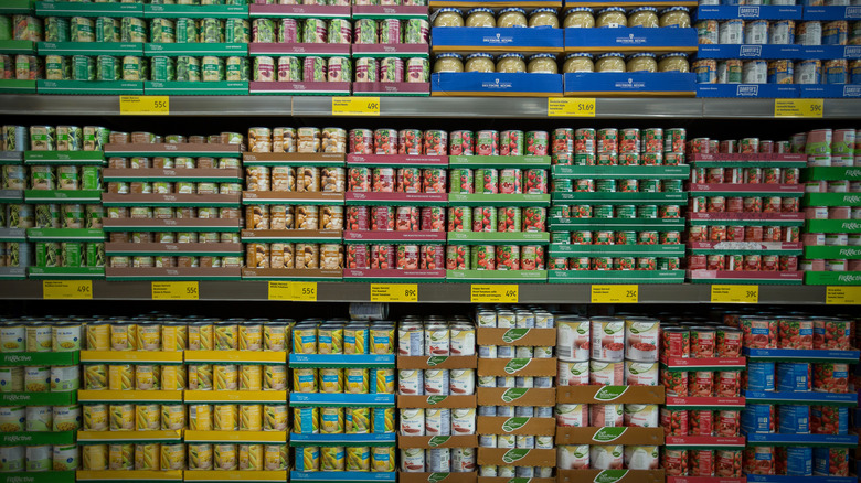 Canned produce on a grocery store shelf