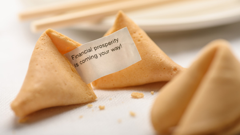 Broken fortune cookie with message inside