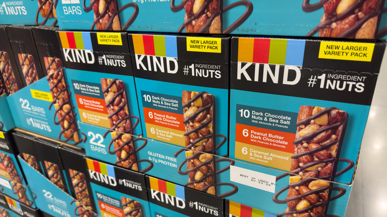 boxes of KIND Savory bars on a shelf in a grocery store