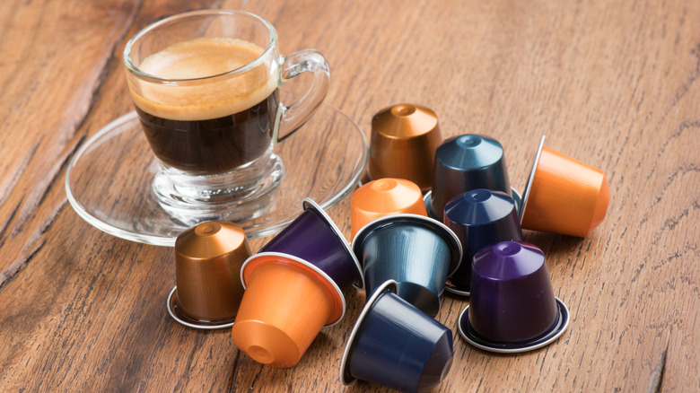 cup of coffee and nespresso pods