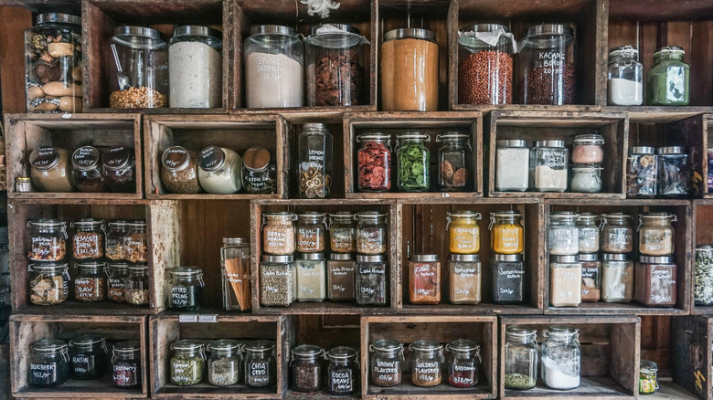 Various spices in glass jars