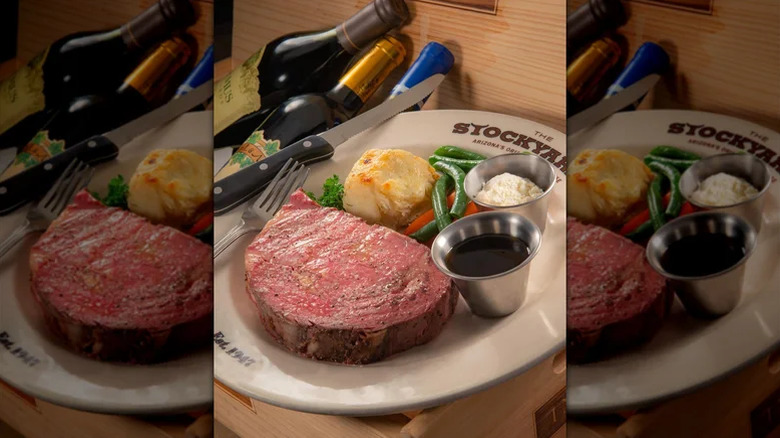 A juicy steak and side of mashed potatoes on a white plate from The Stockyards in Phoenix, Arizona