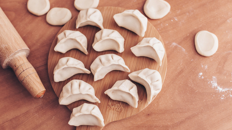 dumplings on wooden board