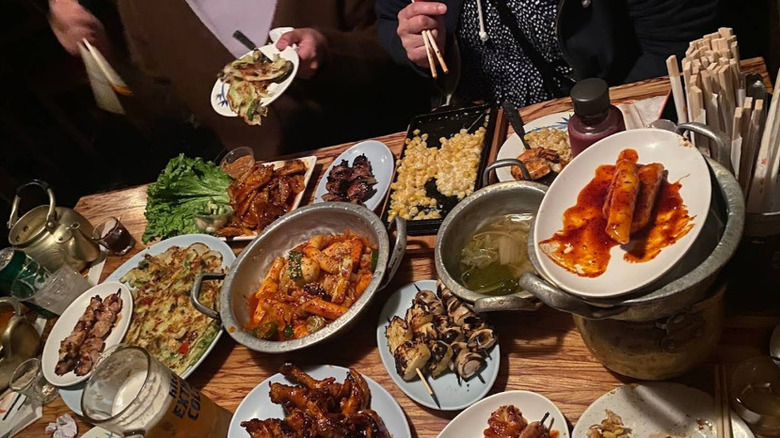 Table filled with food at Dan Sung Sa