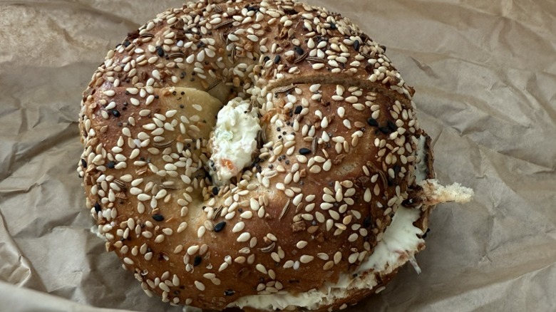 An everything bagel with veggie cream cheese