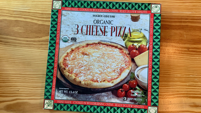 Box of Trader Joe's Organic 3 Cheese Pizza on wooden table