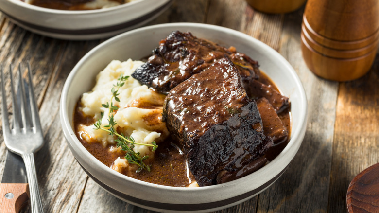 Braised beef short rib with mashed potatoes and sauce