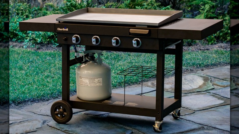 Char-Broil barbecue 4 burner propane flat top griddle in garden