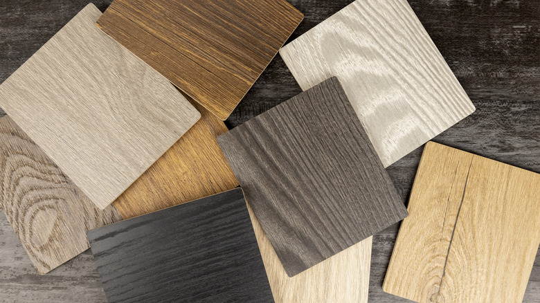 Various wood flooring samples on desk