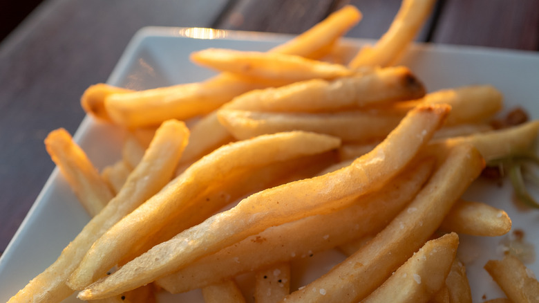A plate of French fries