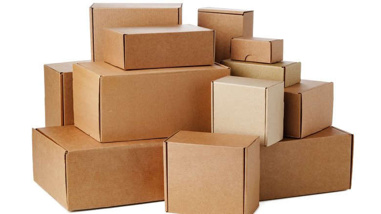 A set of cardboard boxes against an isolated white background