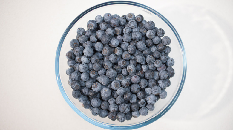 Blueberries in clear glass bowl