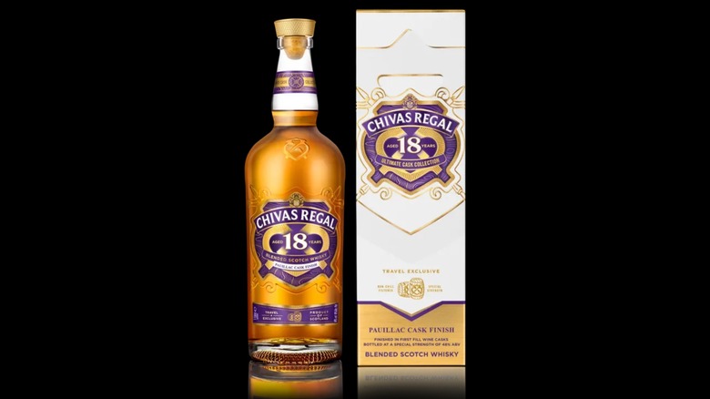 Chivas Regal 18-year Pauillac Wine Finish shown next to its box on a plain black background