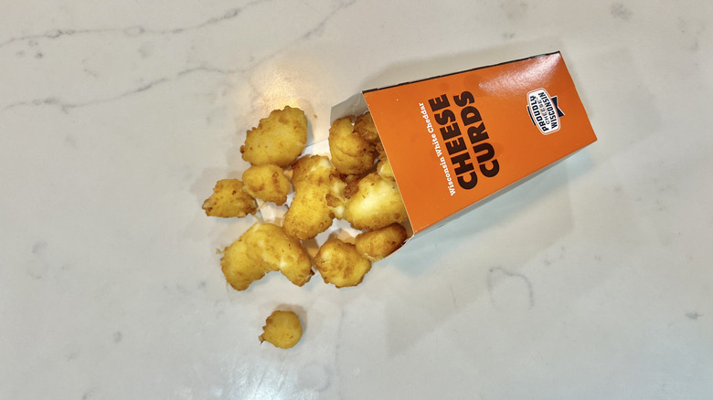A&W cheese curds on marble counter