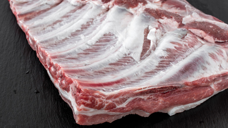 Close up of pork ribs showing marbling
