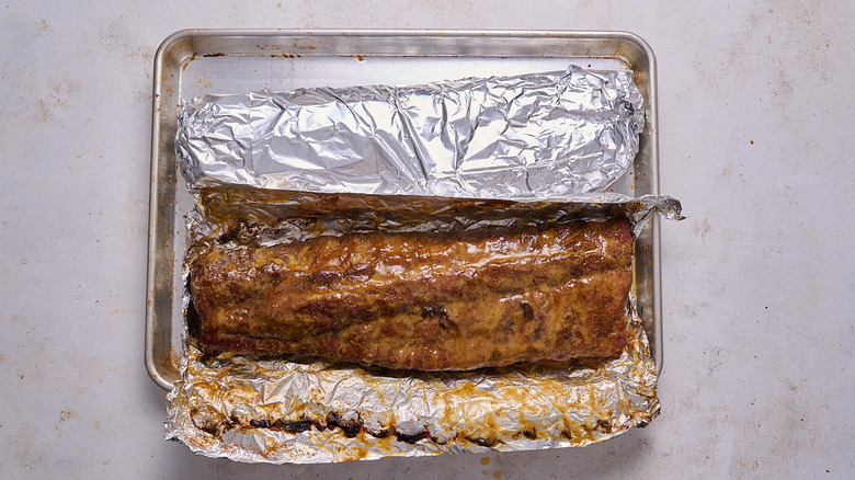 ribs wrapped with foil and baked