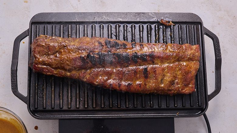 searing ribs on a grill