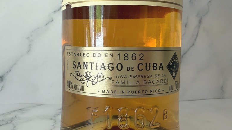 Label on bottom of Bacardi Gold bottle