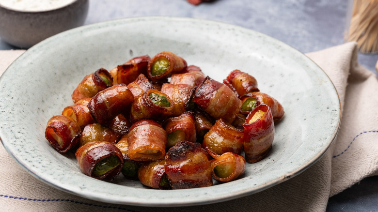 bacon-wrapped balsamic Brussels sprouts in ceramic bowl