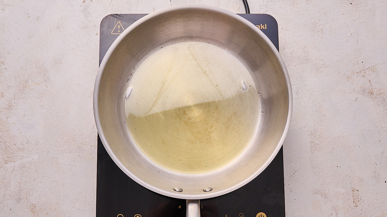 heating skillet with oil