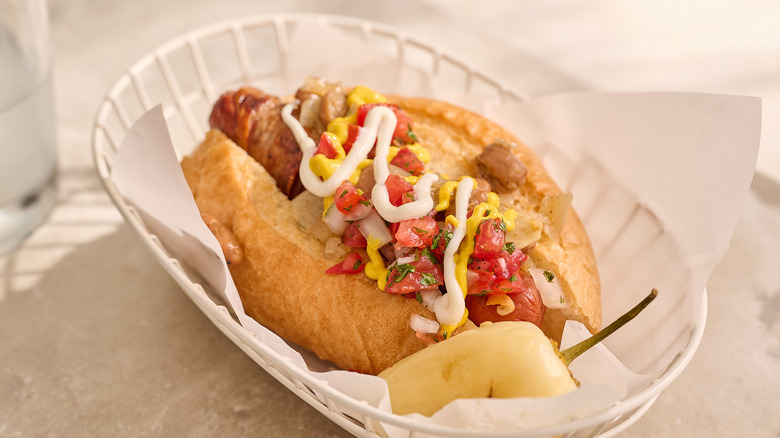 sonoran hot dog with pepper in basket
