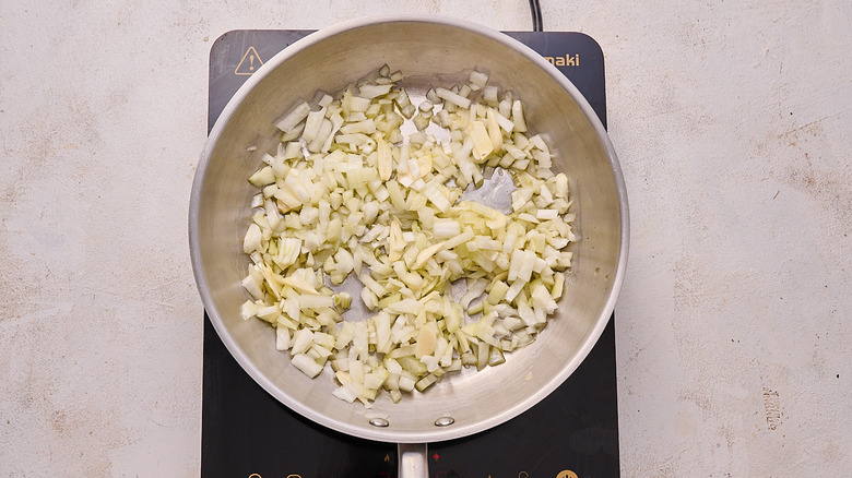 cooking the aromatics in a skillet