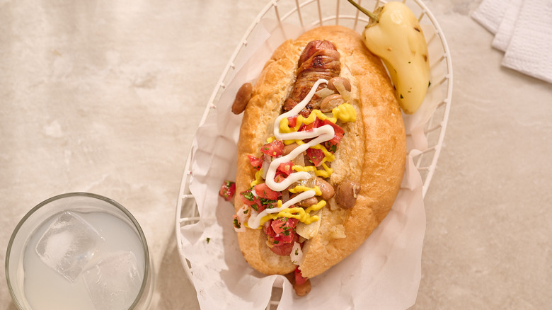 sonoran hot dog in a basket